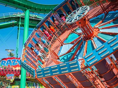People on Cyclone seaside park ride