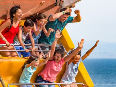 People on Pirate Ship seaside park ride