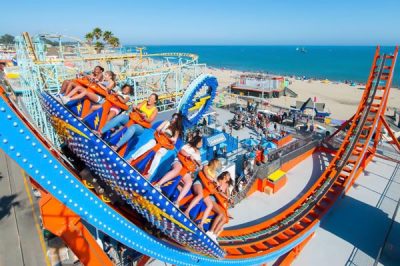 Shockwave seaside park ride with ocean in the background