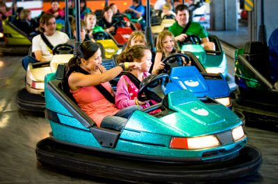 Families enjoying Speed Bumps seaside park ride